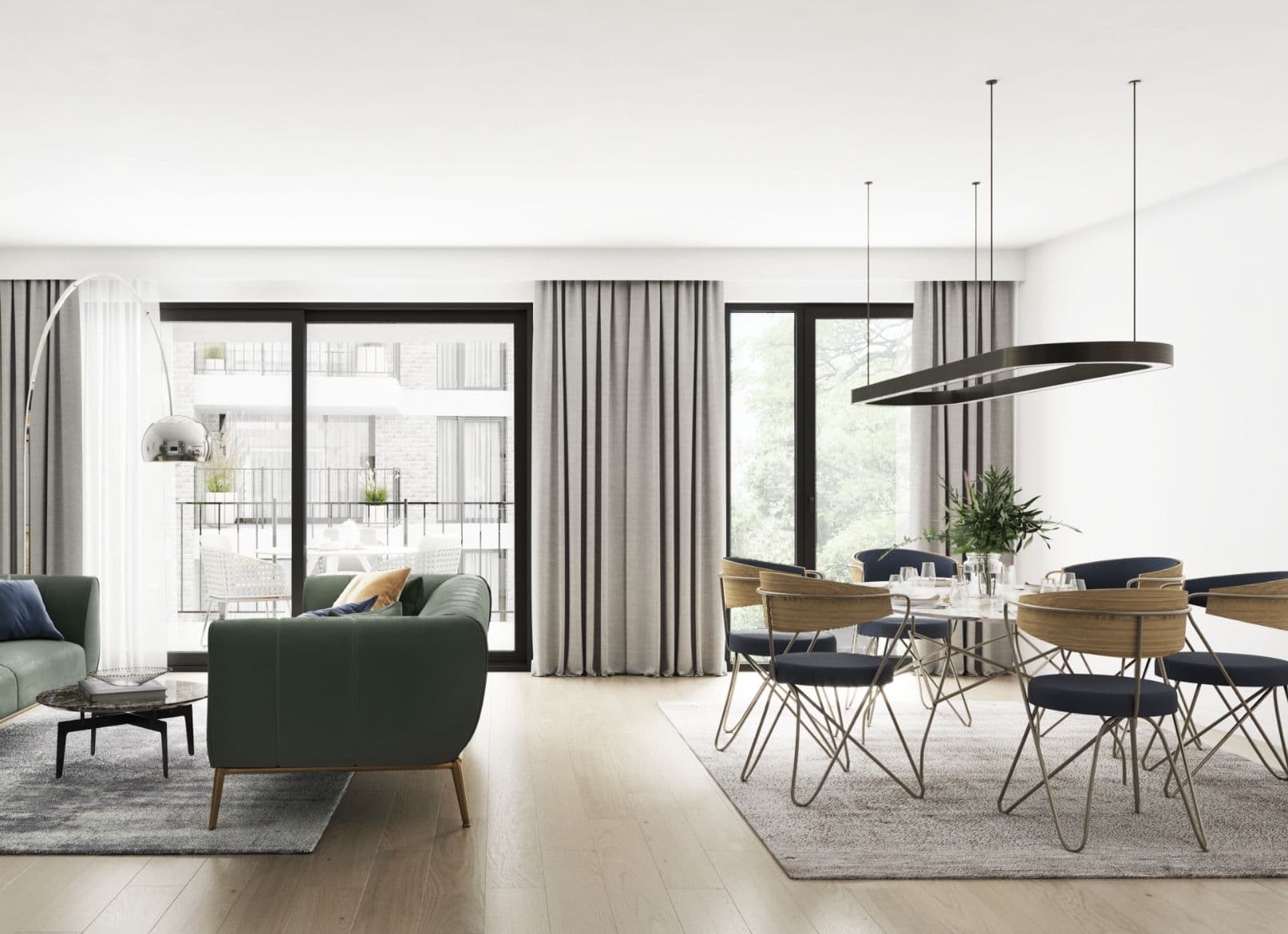 Offener Wohn- und Essbereich einer Park Suites Wohnung mit Designmöbeln, Parkett und bodentiefen Fenstern zum Park